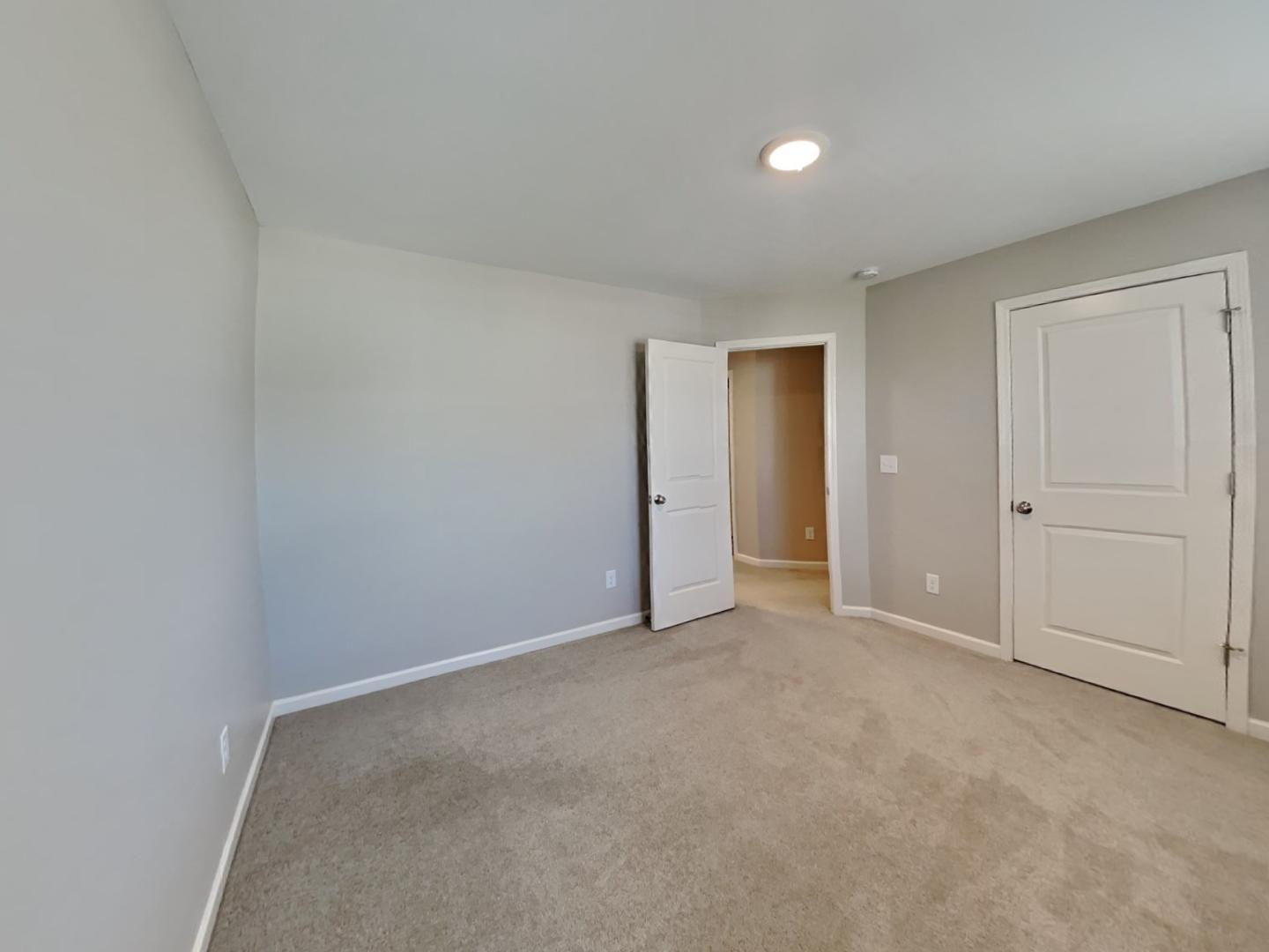 43 Wild Sage Circle Angier, NC 27501 - Photo 12 of 19 an empty room with closet area