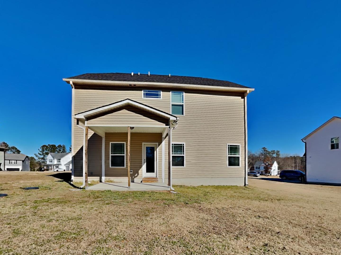 43 Wild Sage Circle Angier, NC 27501 - Photo 19 of 19 a view of a house with a patio