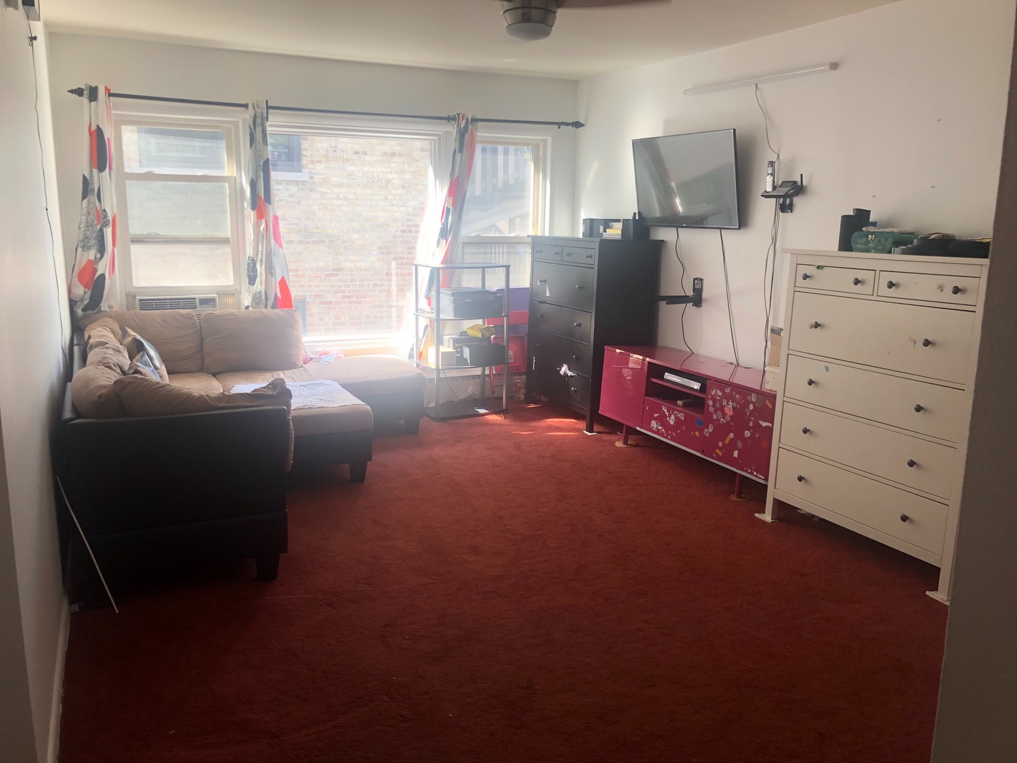 2000 West Arthur Avenue, Unit 2NW Chicago, IL 60645 - Photo 12 of 26 a bed room with a bed and a window