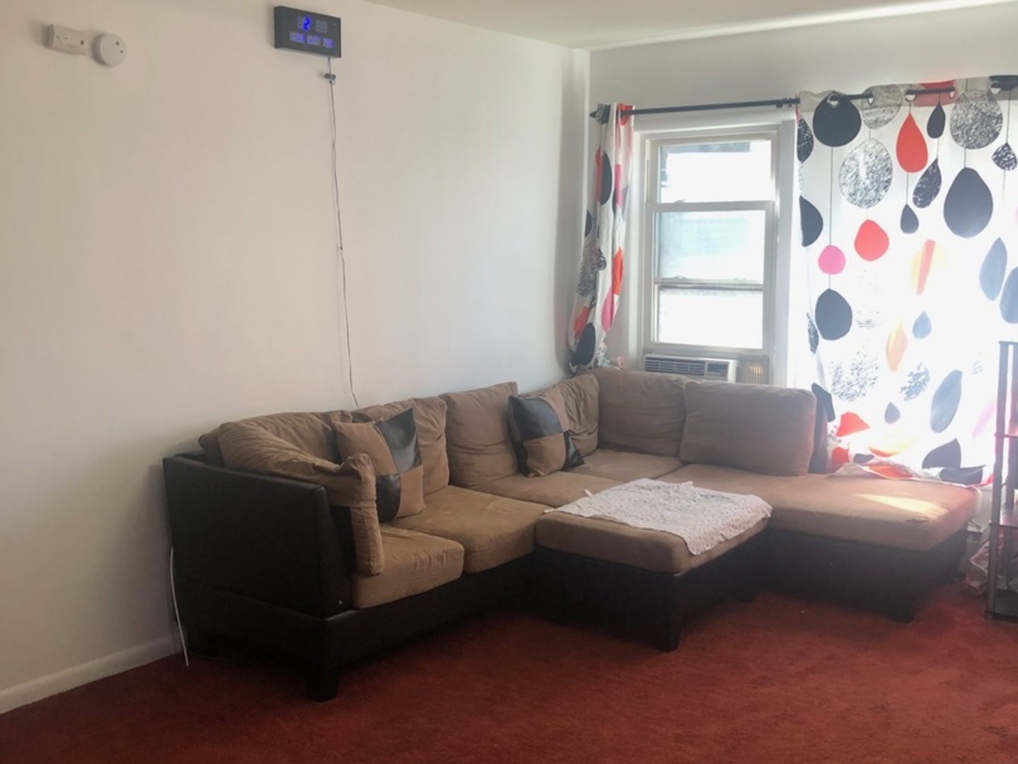 2000 West Arthur Avenue, Unit 2NW Chicago, IL 60645 - Photo 15 of 26 a living room with furniture and a window