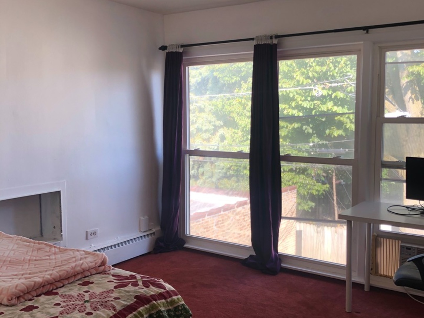 2000 West Arthur Avenue, Unit 2NW Chicago, IL 60645 - Photo 17 of 26 a bedroom with a bed and a large window