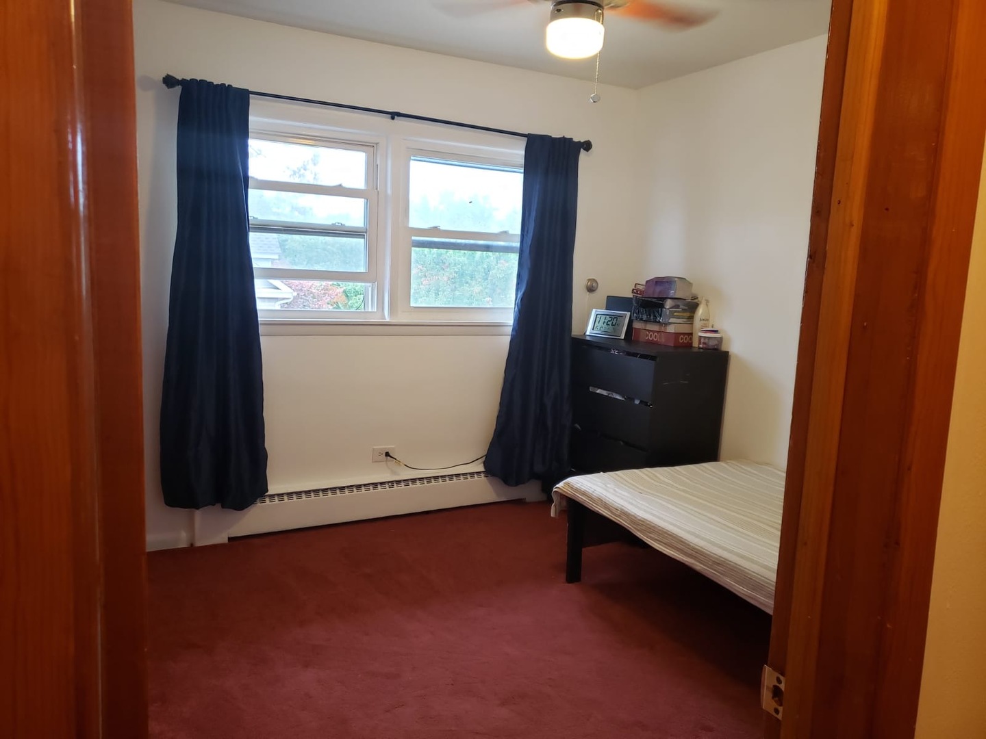 2000 West Arthur Avenue, Unit 2NW Chicago, IL 60645 - Photo 19 of 26 a room with window and lounge chair