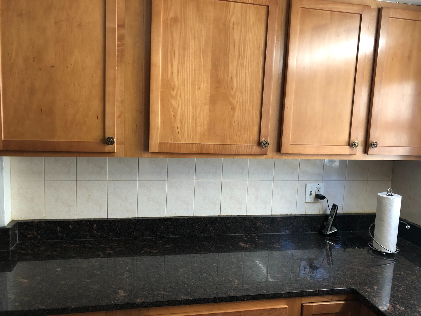2000 West Arthur Avenue, Unit 2NW Chicago, IL 60645 - Photo 9 of 26 a kitchen with stainless steel appliances granite countertop a stove a microwave and cabinets