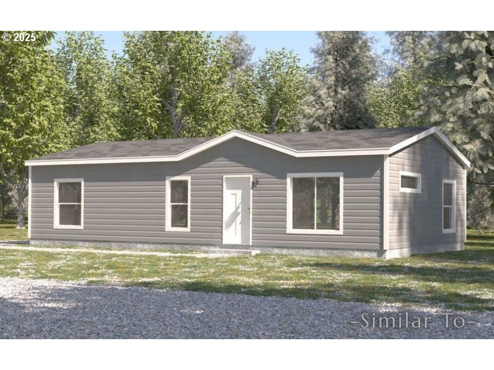 3223 Comber Court Northeast Salem, OR 97305 - Photo 1 of 39 a front view of a house with a yard