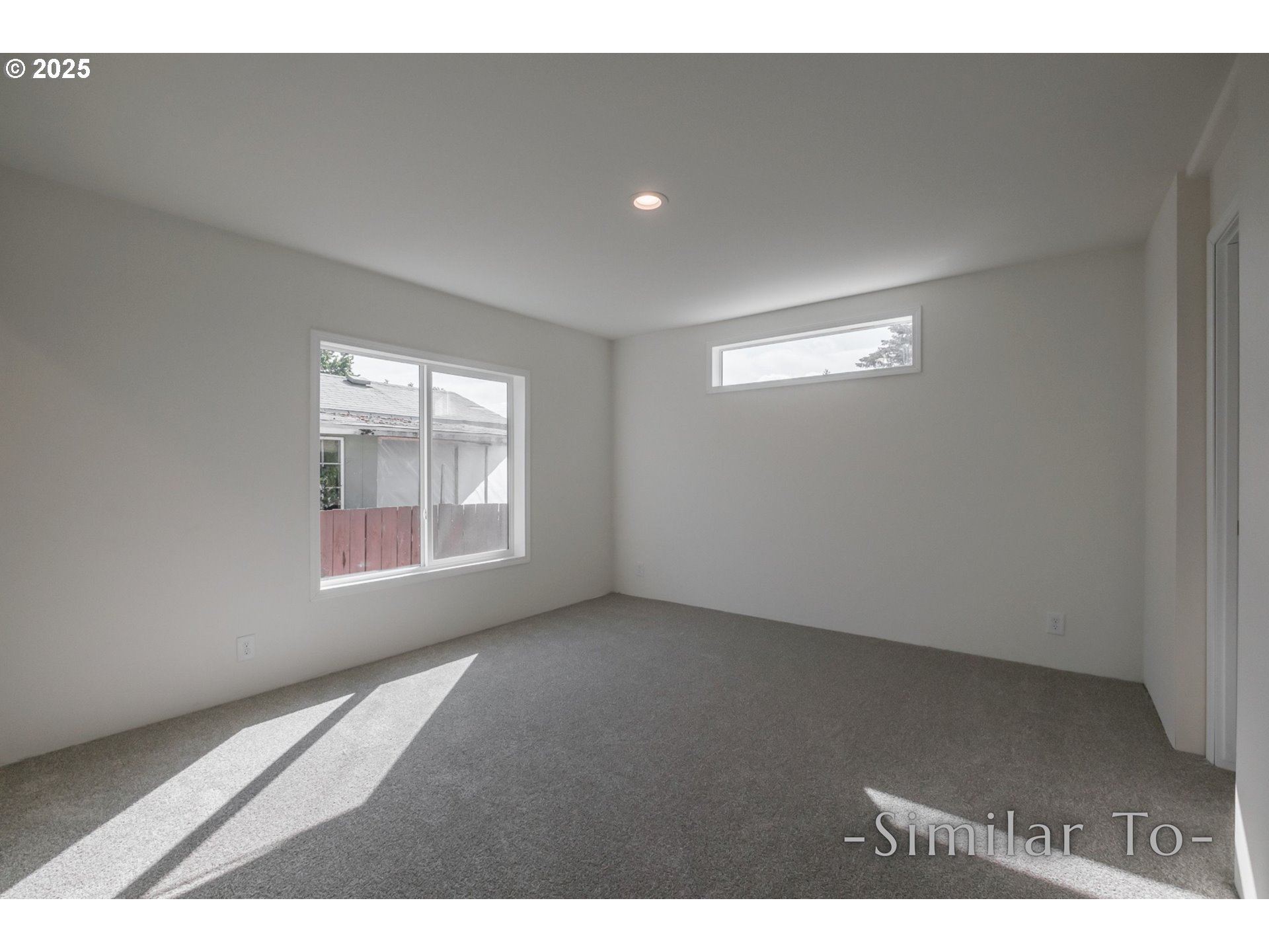 3223 Comber Court Northeast Salem, OR 97305 - Photo 12 of 39 a view of an empty room with a window