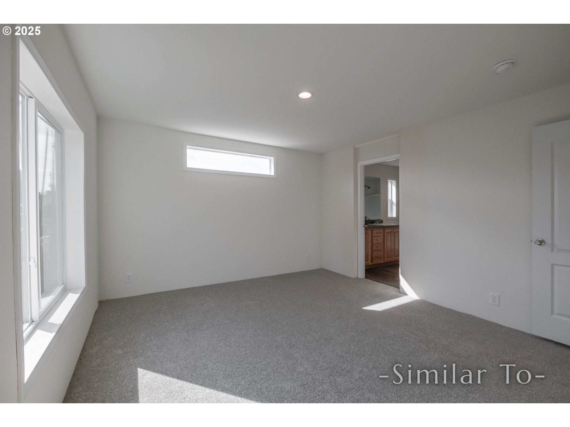 3223 Comber Court Northeast Salem, OR 97305 - Photo 16 of 39 a view of an empty room with a window