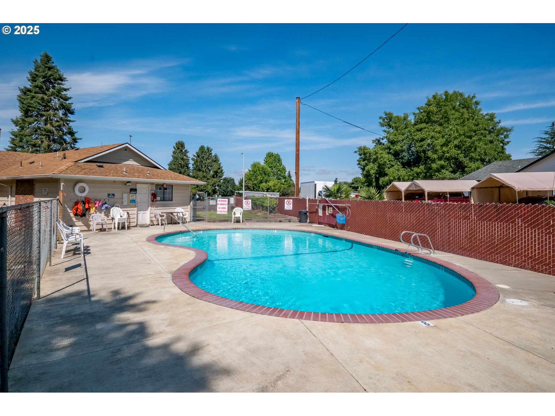 3223 Comber Court Northeast Salem, OR 97305 - Photo 31 of 39 a view of swimming pool with outdoor seating