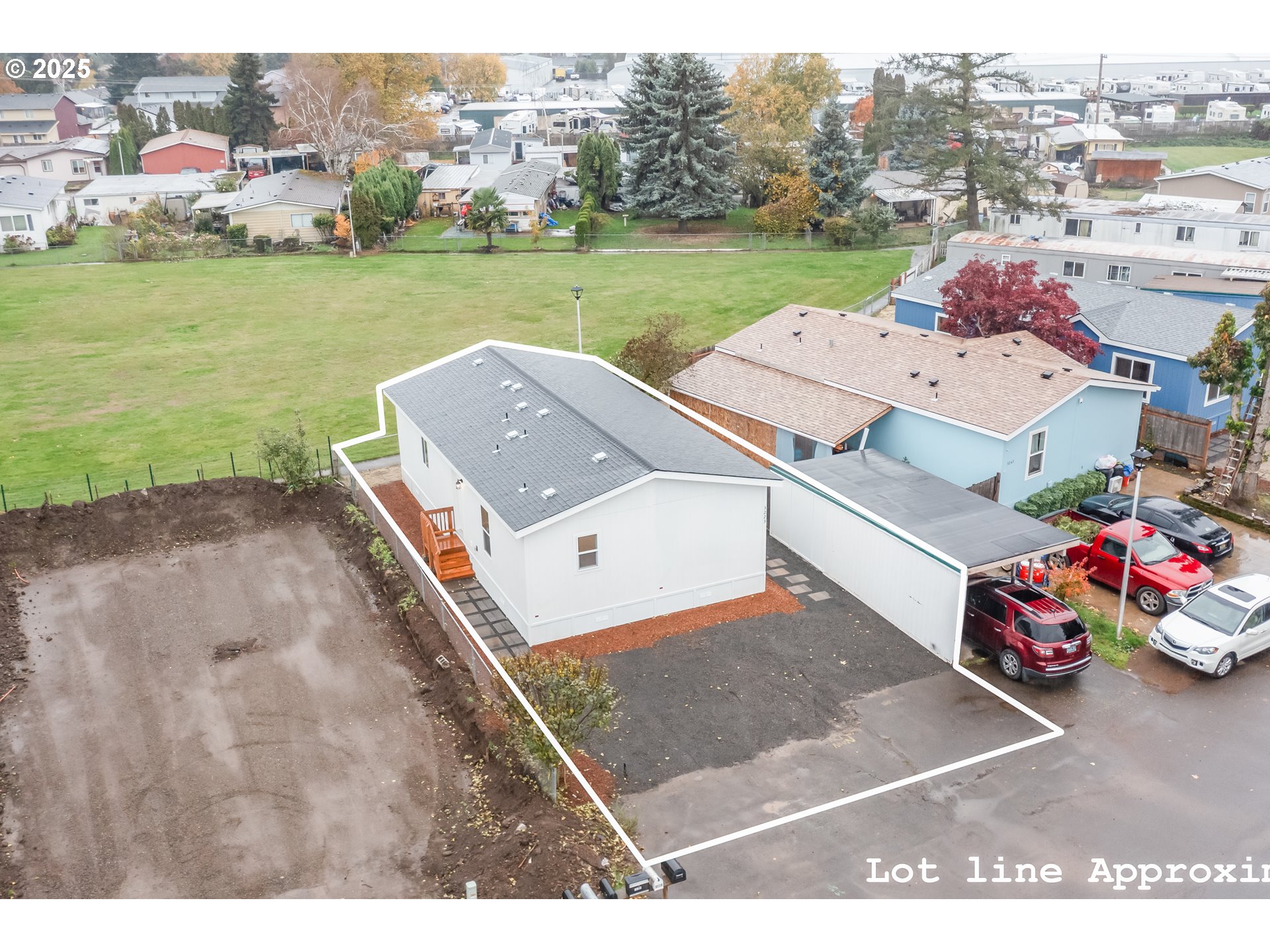 3223 Comber Court Northeast Salem, OR 97305 - Photo 35 of 39 an aerial view of a house with a garden and houses