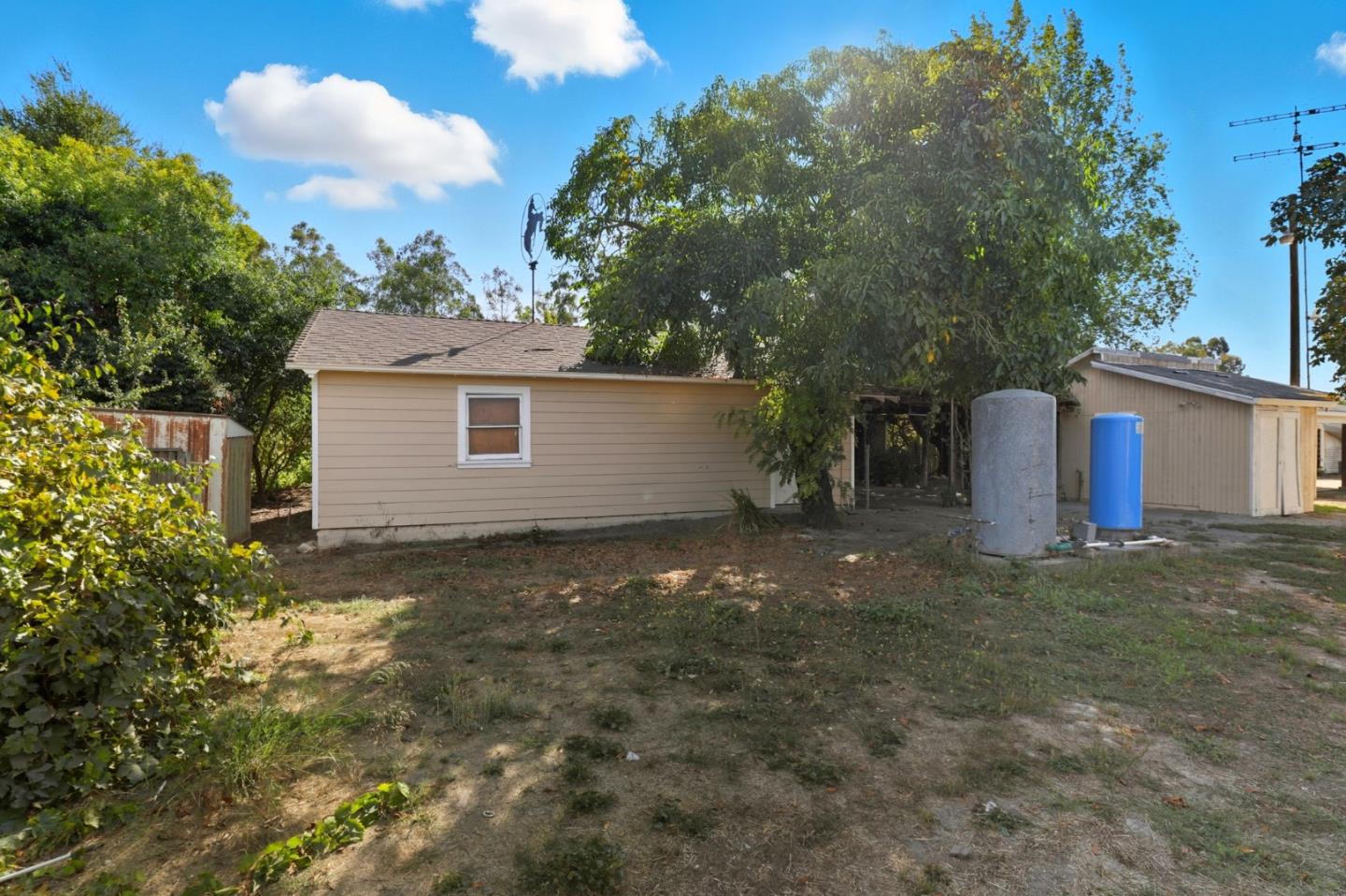 790 Shore Road Hollister, CA 95023 - Photo 36 of 70 a view of a house with a yard and garage