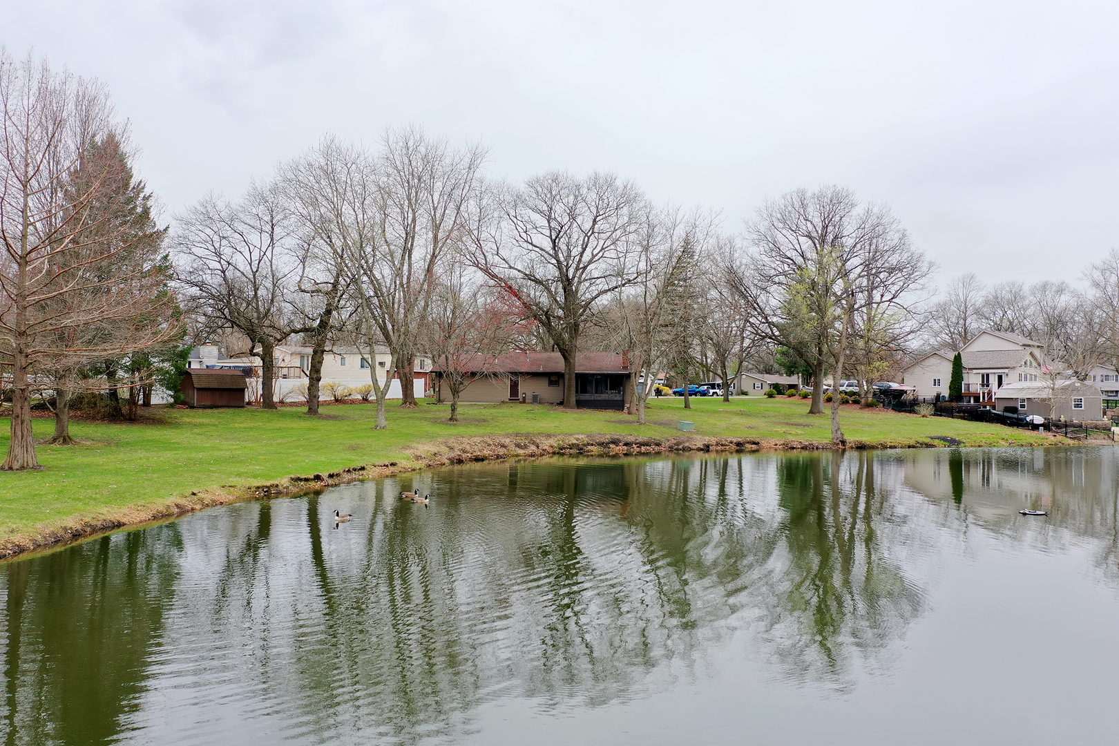 1173 Cecil Drive Kankakee, IL 60901 - Photo 28 of 32 a view of a lake with houses