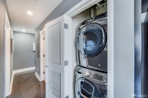 a view of a storage & utility room with washer and dryer