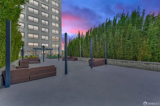 a view of a couch in front of a building