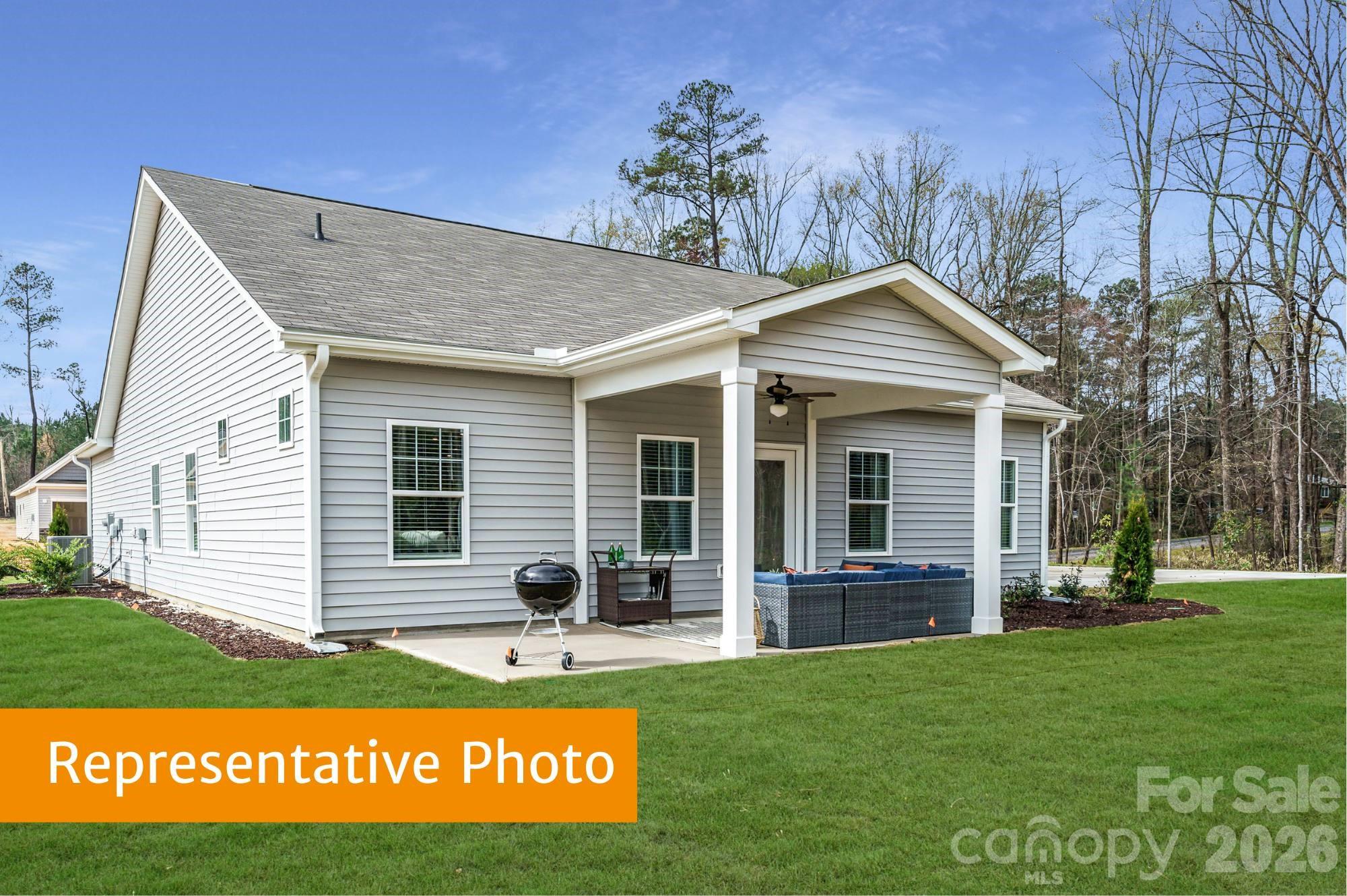 443 Blue Mountain Road Salisbury, NC 28147 - Photo 19 of 21 a view of a house with a yard