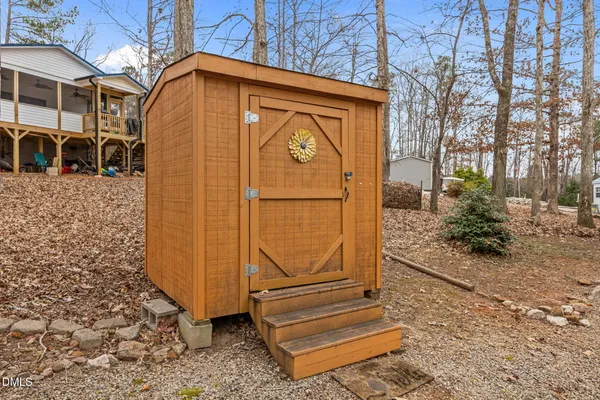 a view of a couches in backyard of house