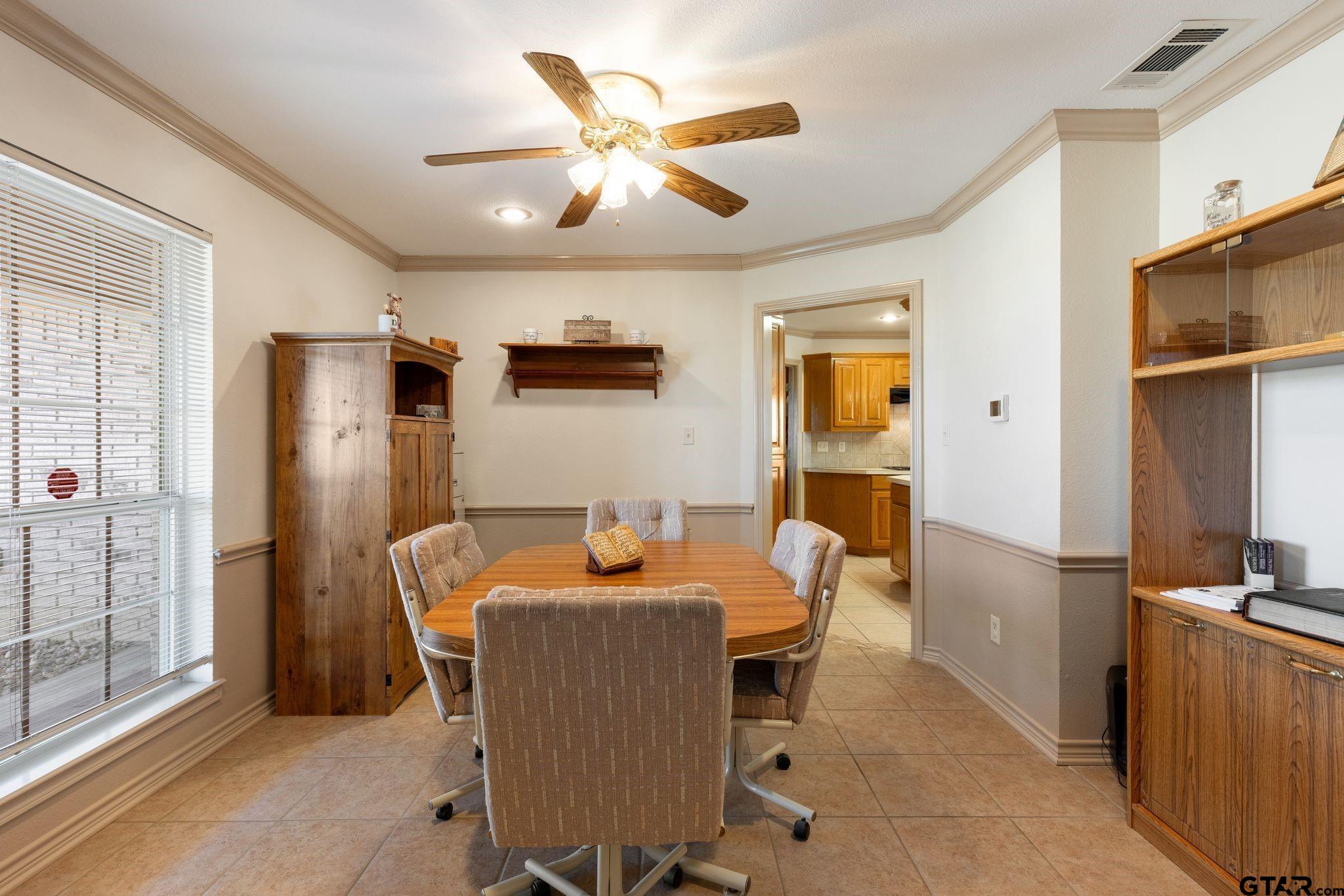 4 County Road 3566 Dike, TX 75437 - Photo 14 of 36 a living room with furniture a ceiling fan and a window