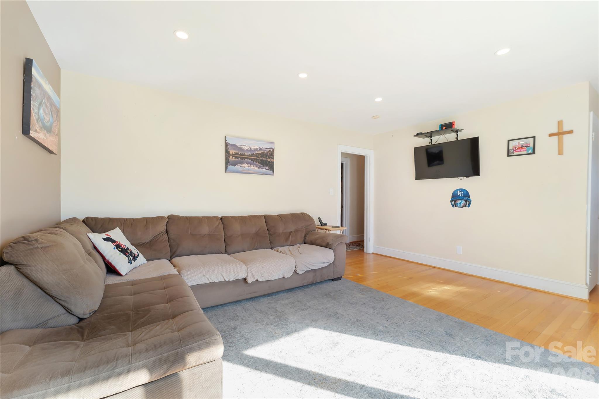 6268 Long Island Road Catawba, NC 28609 - Photo 12 of 38 a living room with furniture and a flat screen tv