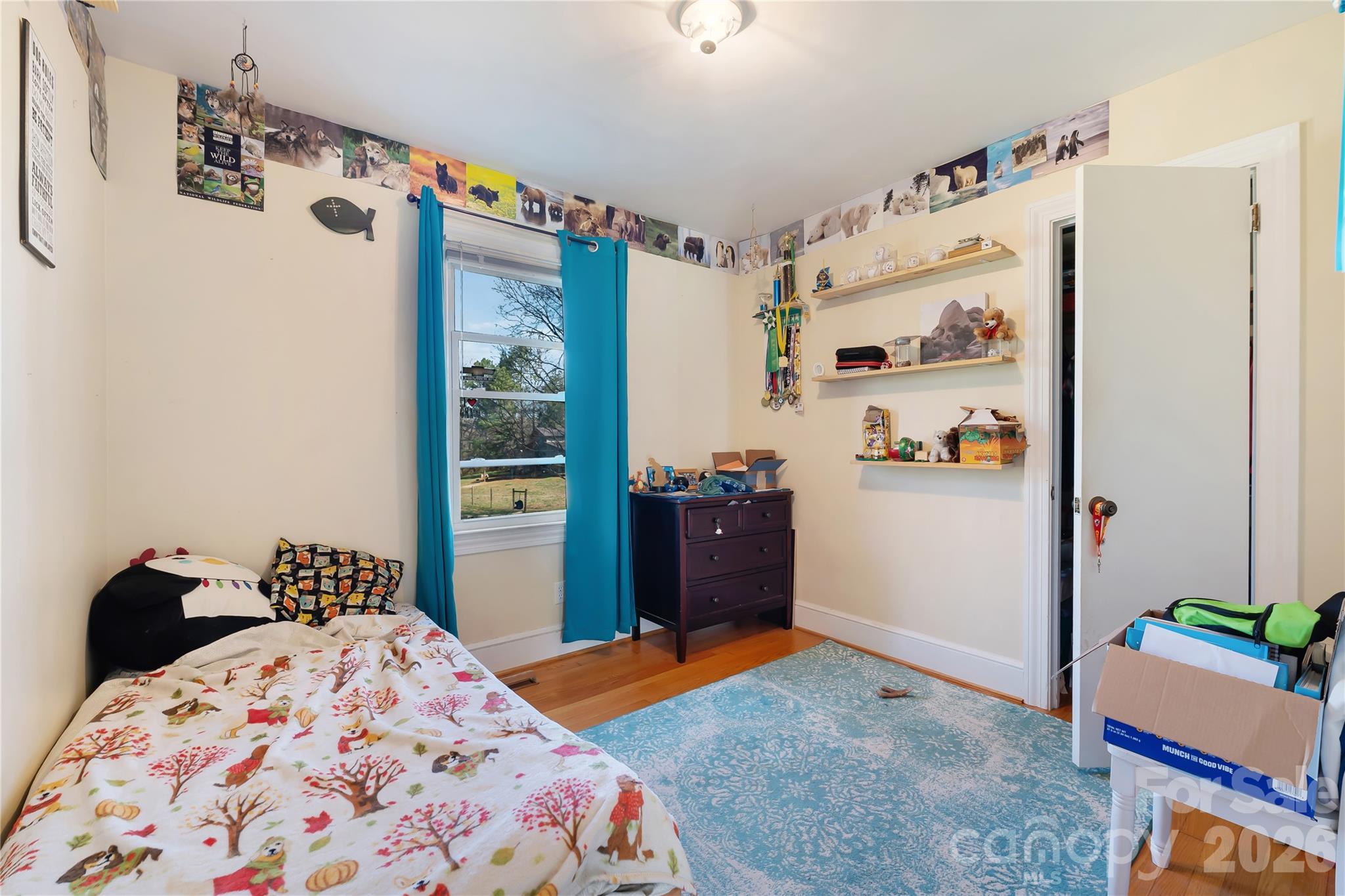 6268 Long Island Road Catawba, NC 28609 - Photo 16 of 38 a bedroom with a bed and a refrigerator