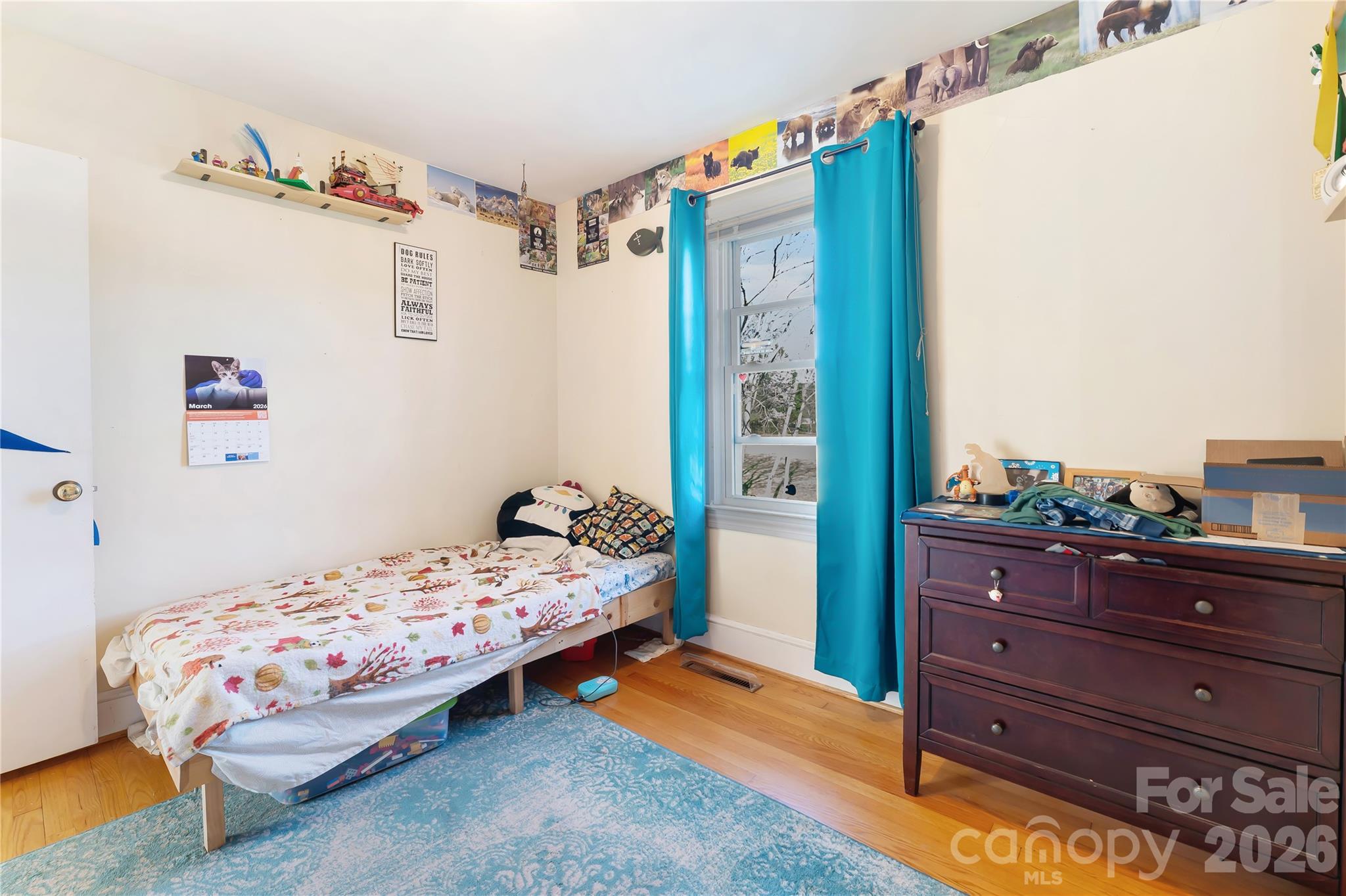 6268 Long Island Road Catawba, NC 28609 - Photo 17 of 38 a bedroom with a bed and a dresser in it
