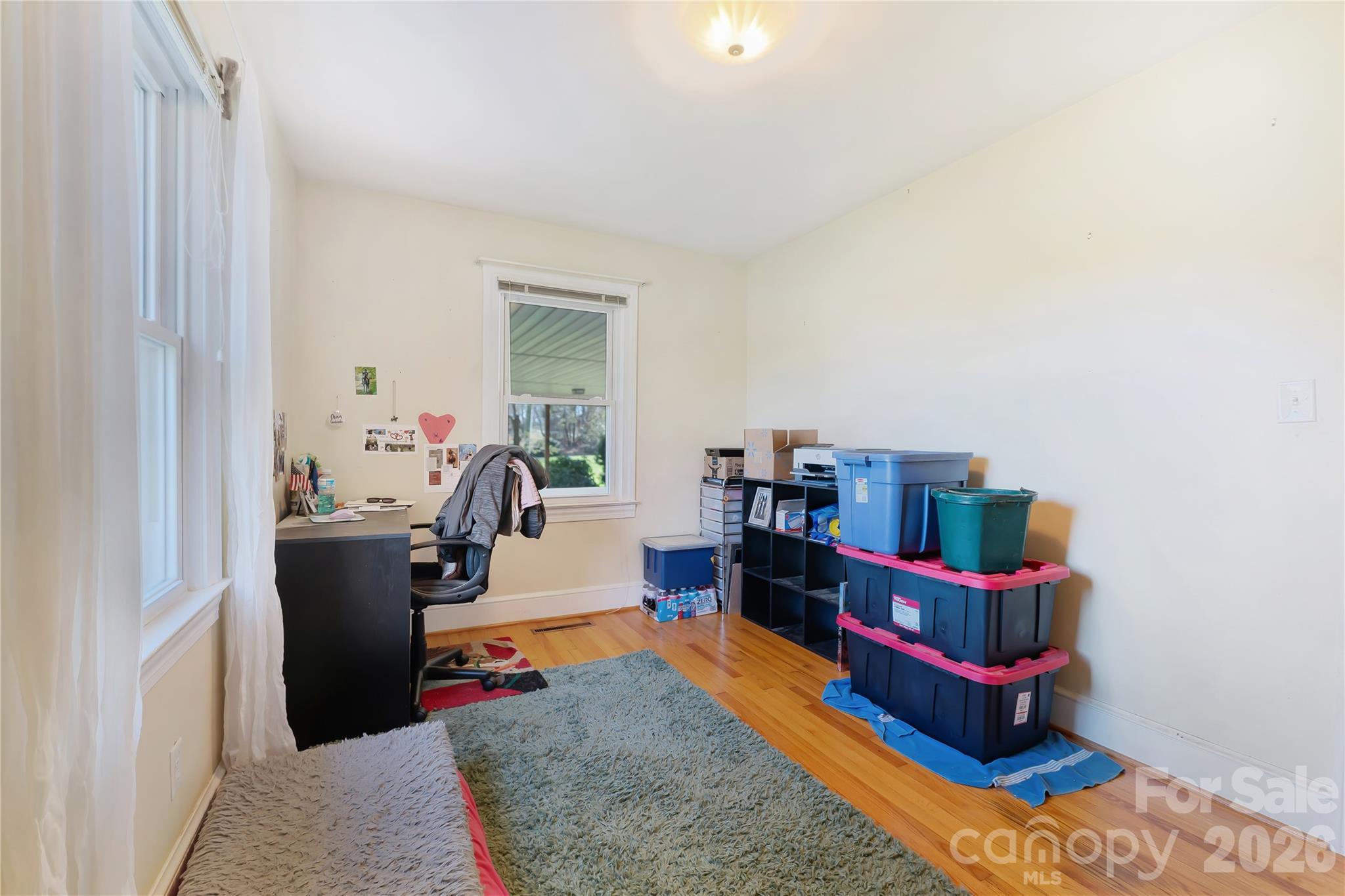 6268 Long Island Road Catawba, NC 28609 - Photo 19 of 38 a living room with furniture and a book shelf