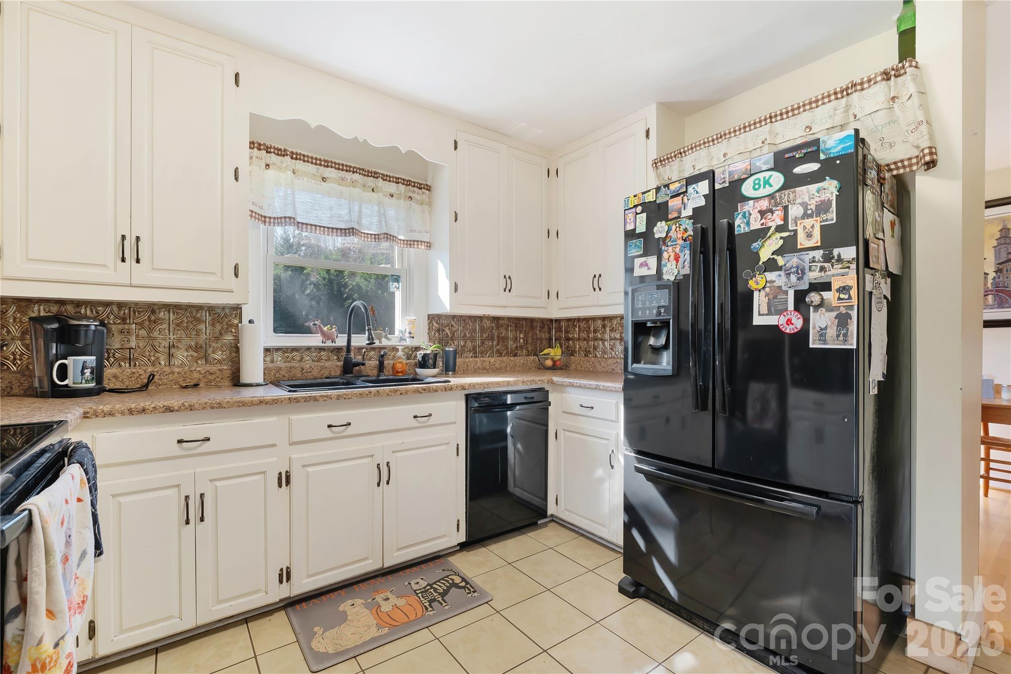 6268 Long Island Road Catawba, NC 28609 - Photo 5 of 38 a kitchen with a refrigerator a sink and cabinets