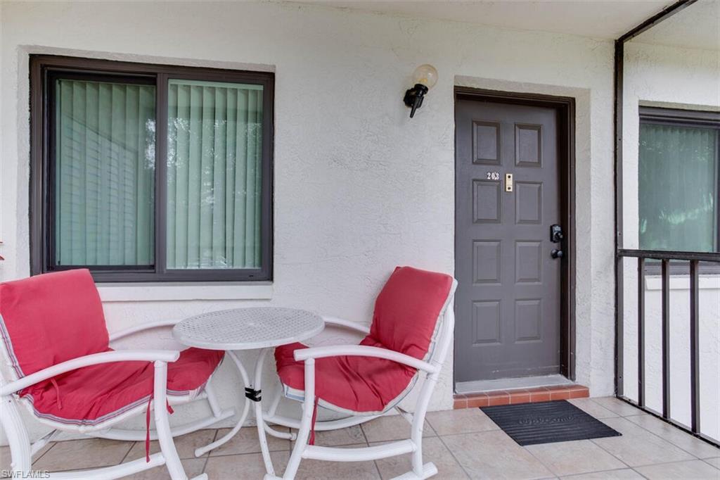 4351 27th Court Southwest, Unit 203 Naples, FL 34116 - Photo 9 of 34 View of exterior entry