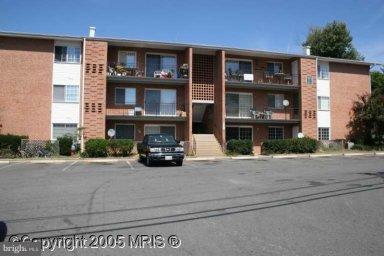 631 Waterloo Road, Unit 121 Warrenton, VA 20186 - Photo 1 of 5 a view of building with car parked