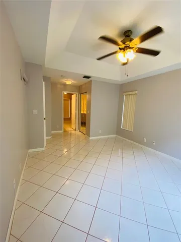 a view of an empty room and window