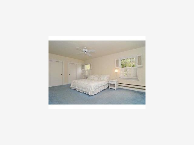 71 Ralston Road Atherton, CA 94027 - Photo 6 of 9 a picture of a room with a white bed