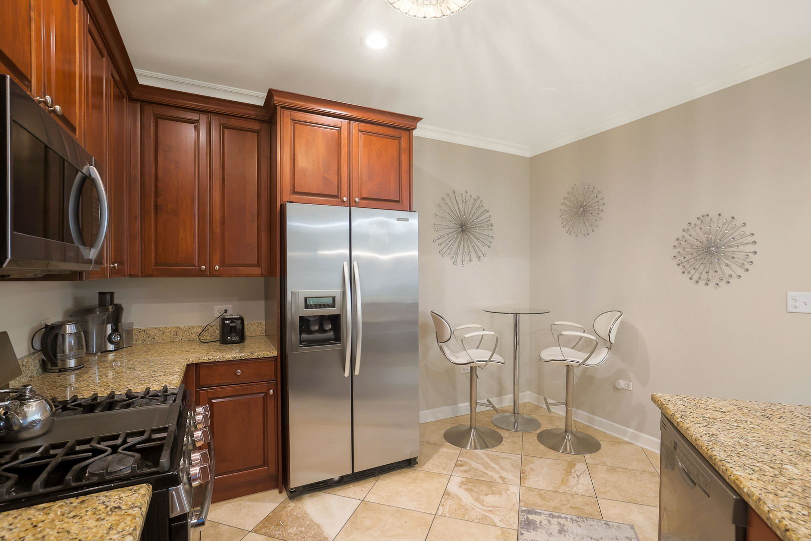 50 North Plum Grove Road, Unit 511E Palatine, IL 60067 - Photo 13 of 28 a kitchen with stainless steel appliances granite countertop a refrigerator a stove and a sink