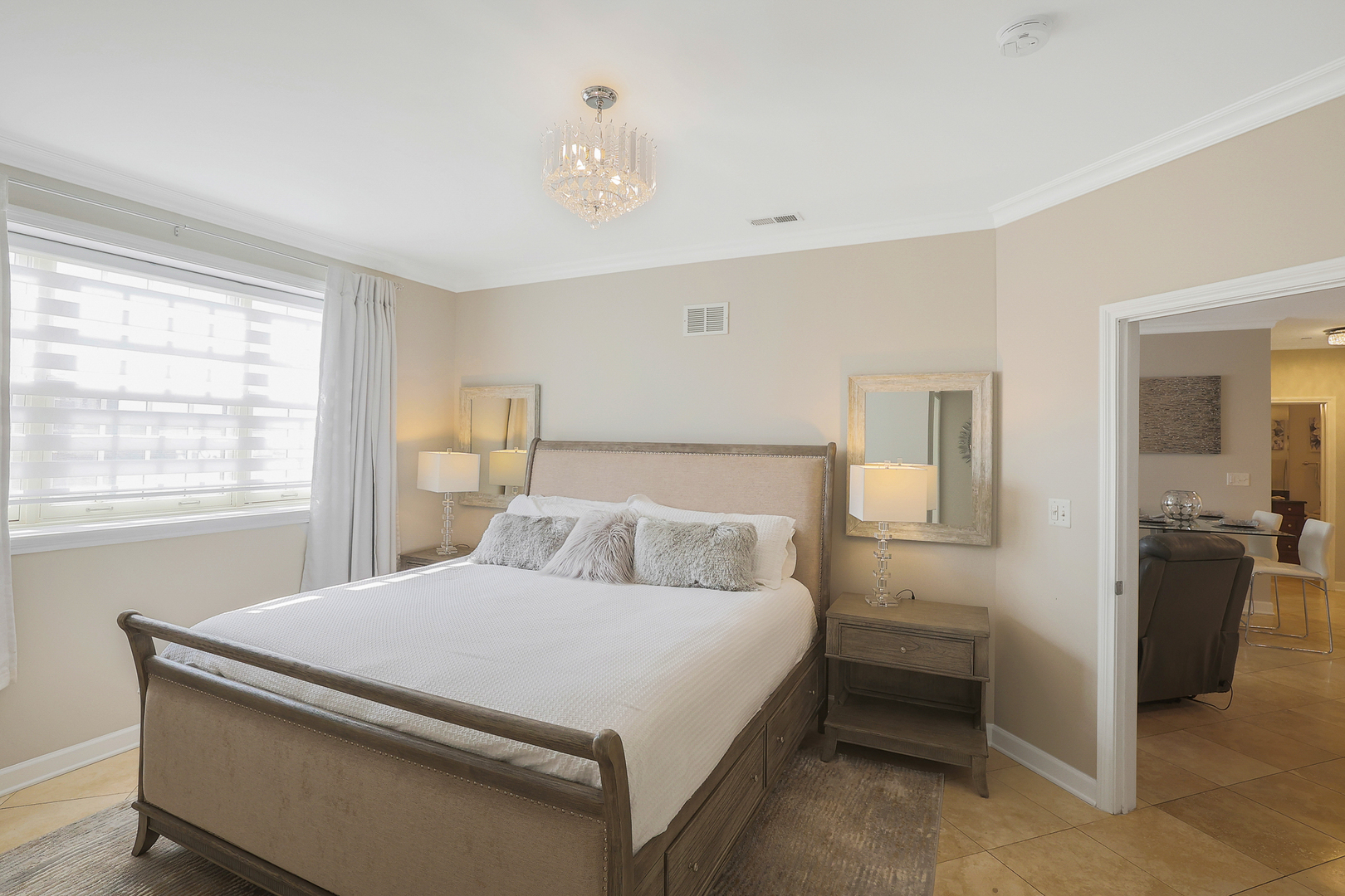 50 North Plum Grove Road, Unit 511E Palatine, IL 60067 - Photo 16 of 28 a bedroom with a bed and a window