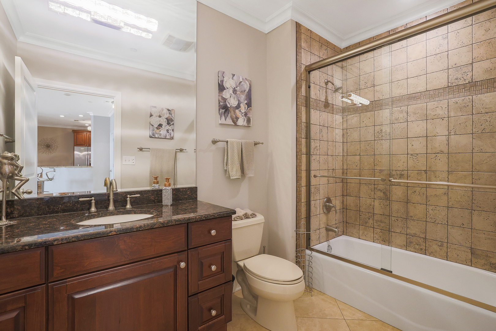 50 North Plum Grove Road, Unit 511E Palatine, IL 60067 - Photo 23 of 28 a bathroom with a granite countertop sink a toilet and shower
