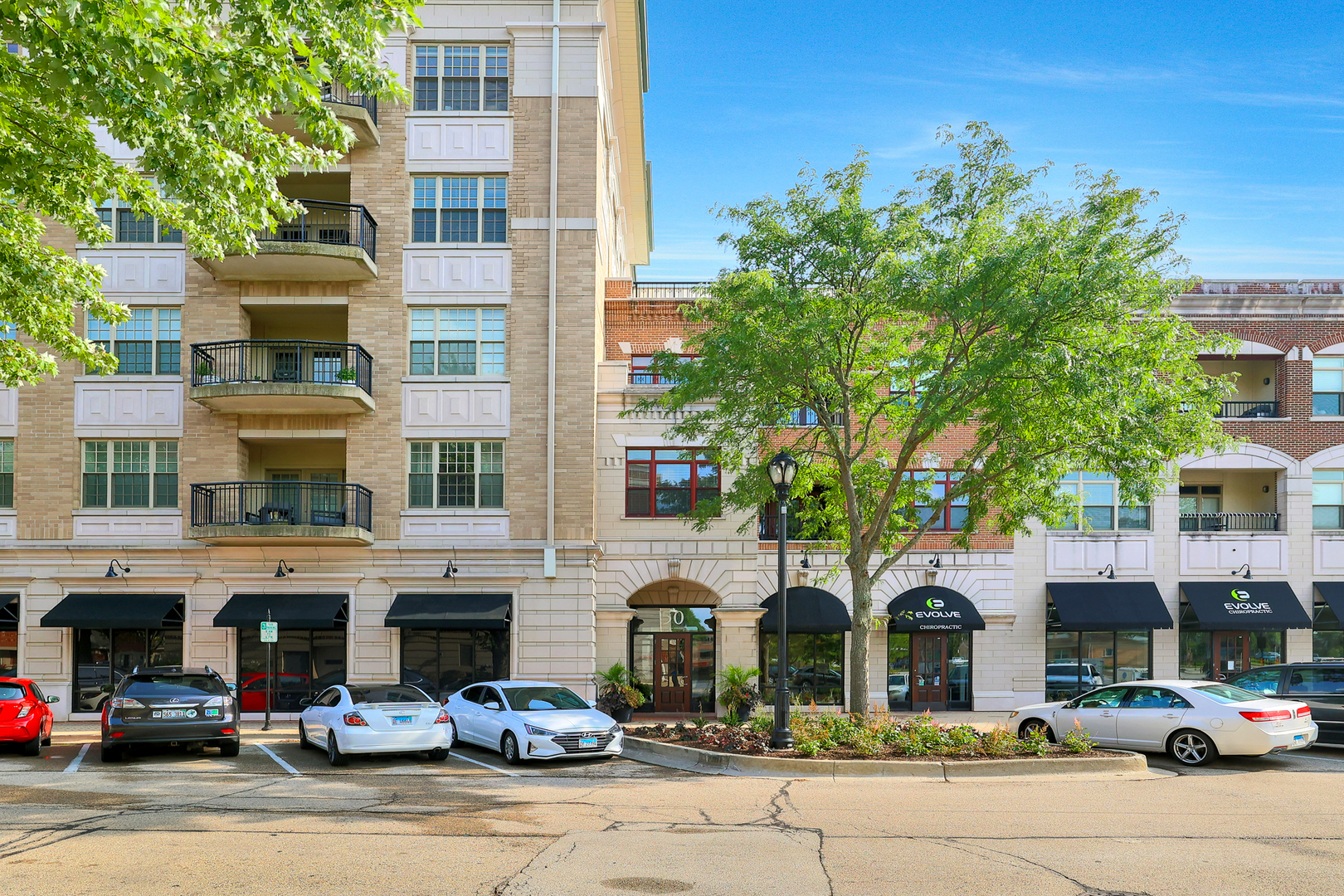 50 North Plum Grove Road, Unit 511E Palatine, IL 60067 - Photo 3 of 28 a view of a street with cars