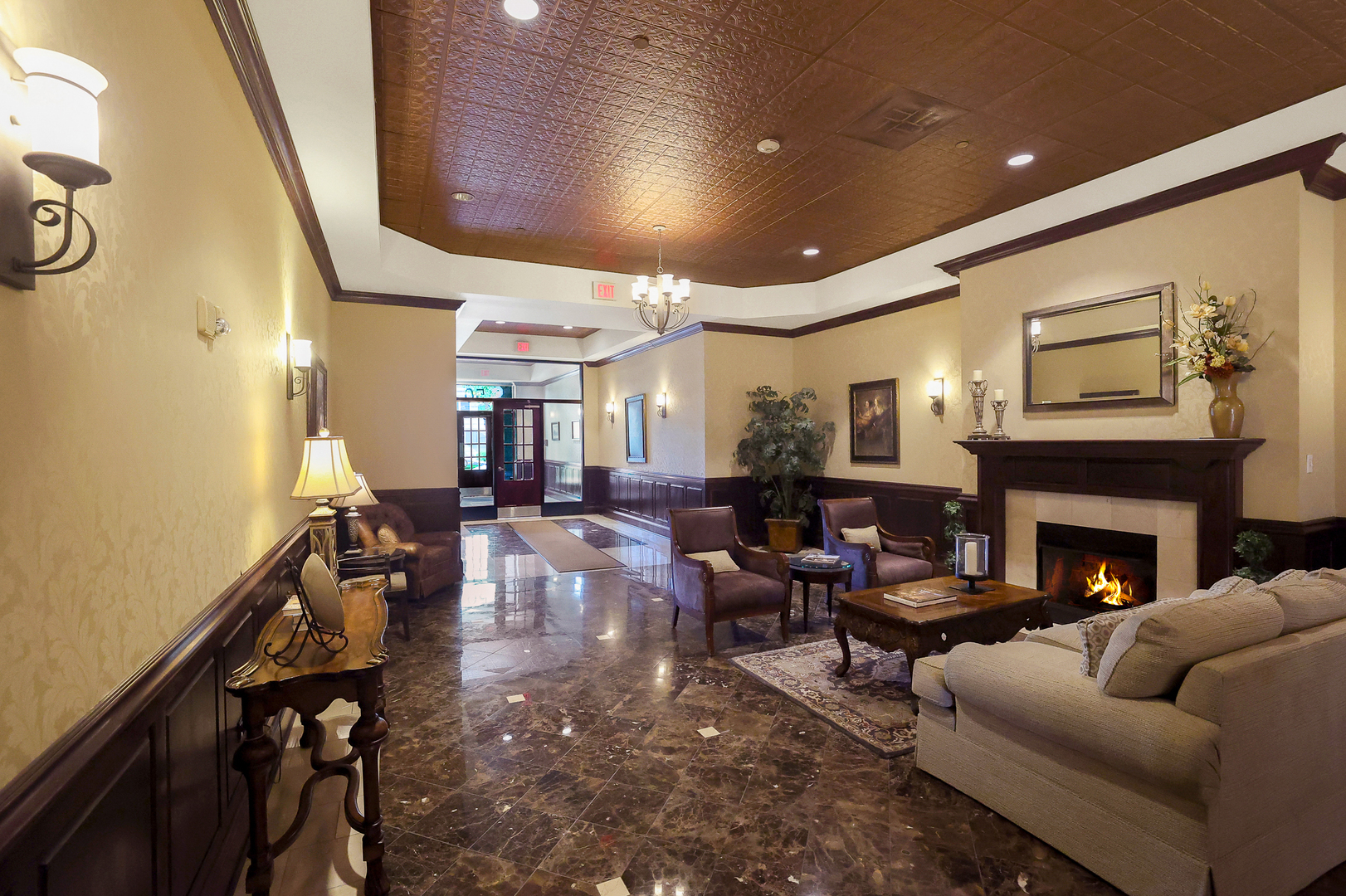 50 North Plum Grove Road, Unit 511E Palatine, IL 60067 - Photo 6 of 28 a living room with furniture and a fireplace