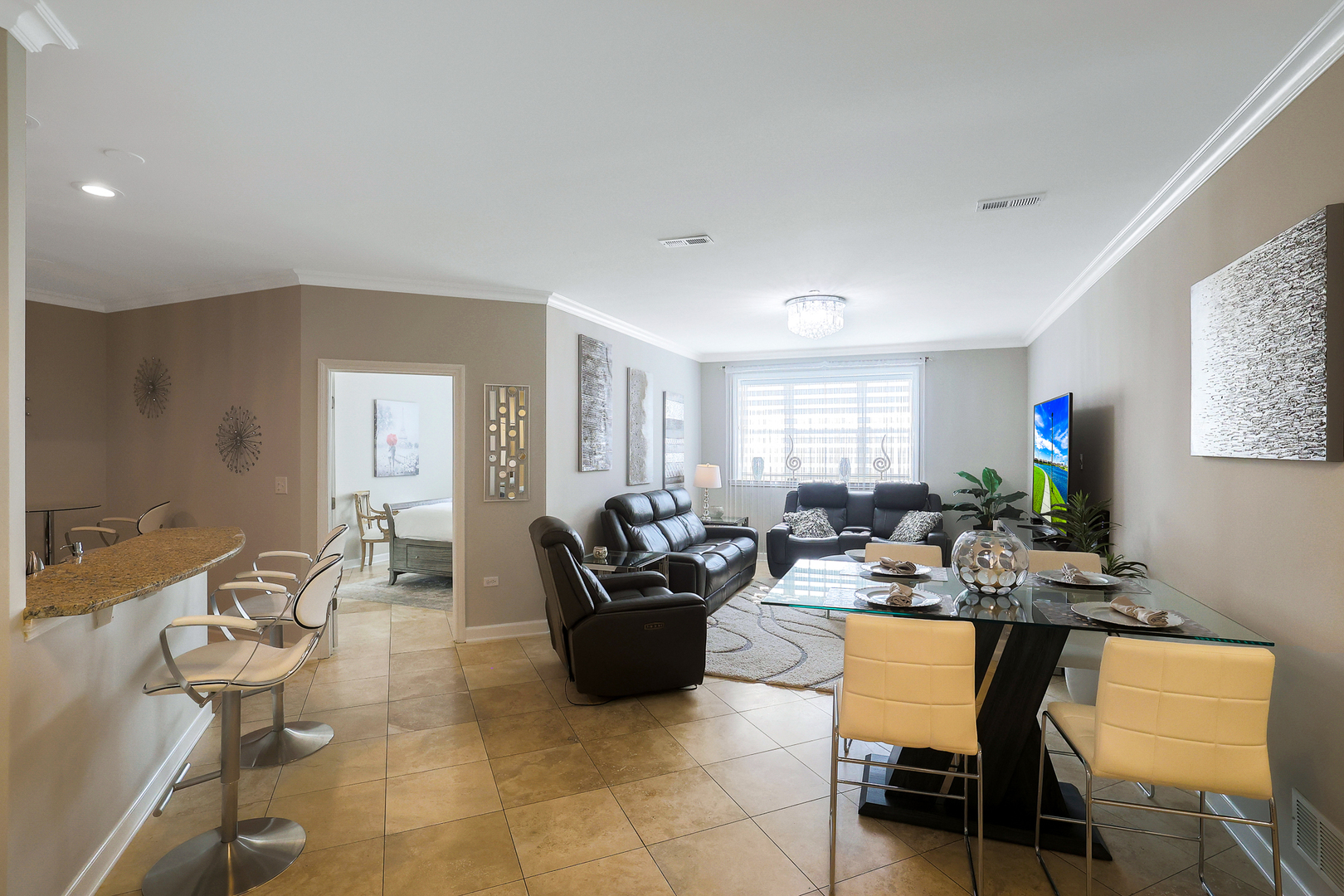50 North Plum Grove Road, Unit 511E Palatine, IL 60067 - Photo 7 of 28 a living room with furniture and a potted plant