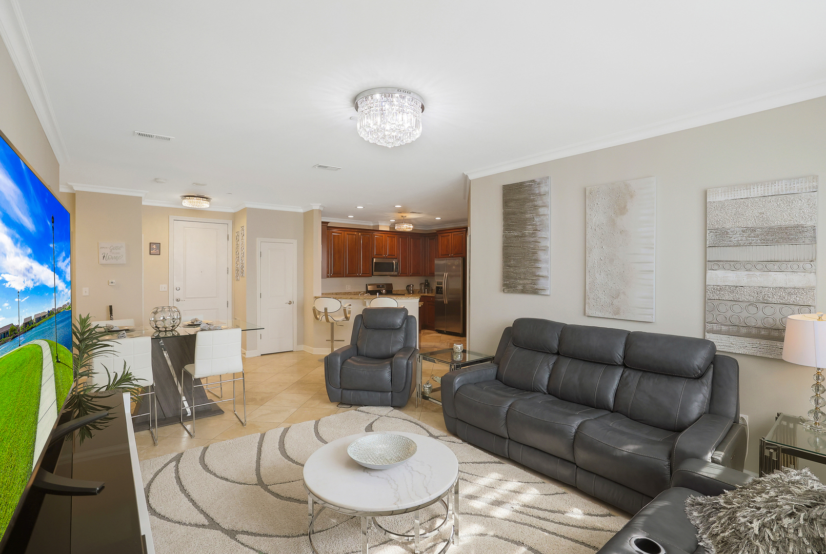 50 North Plum Grove Road, Unit 511E Palatine, IL 60067 - Photo 8 of 28 a living room with furniture kitchen view and a large window