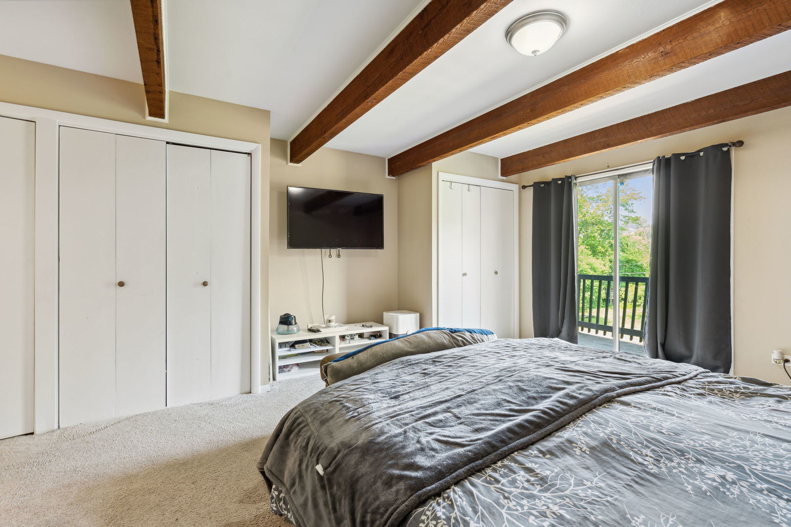 1741 Oak Lane Road Flossmoor, IL 60422 - Photo 14 of 30 a bedroom with a bed and a flat screen tv