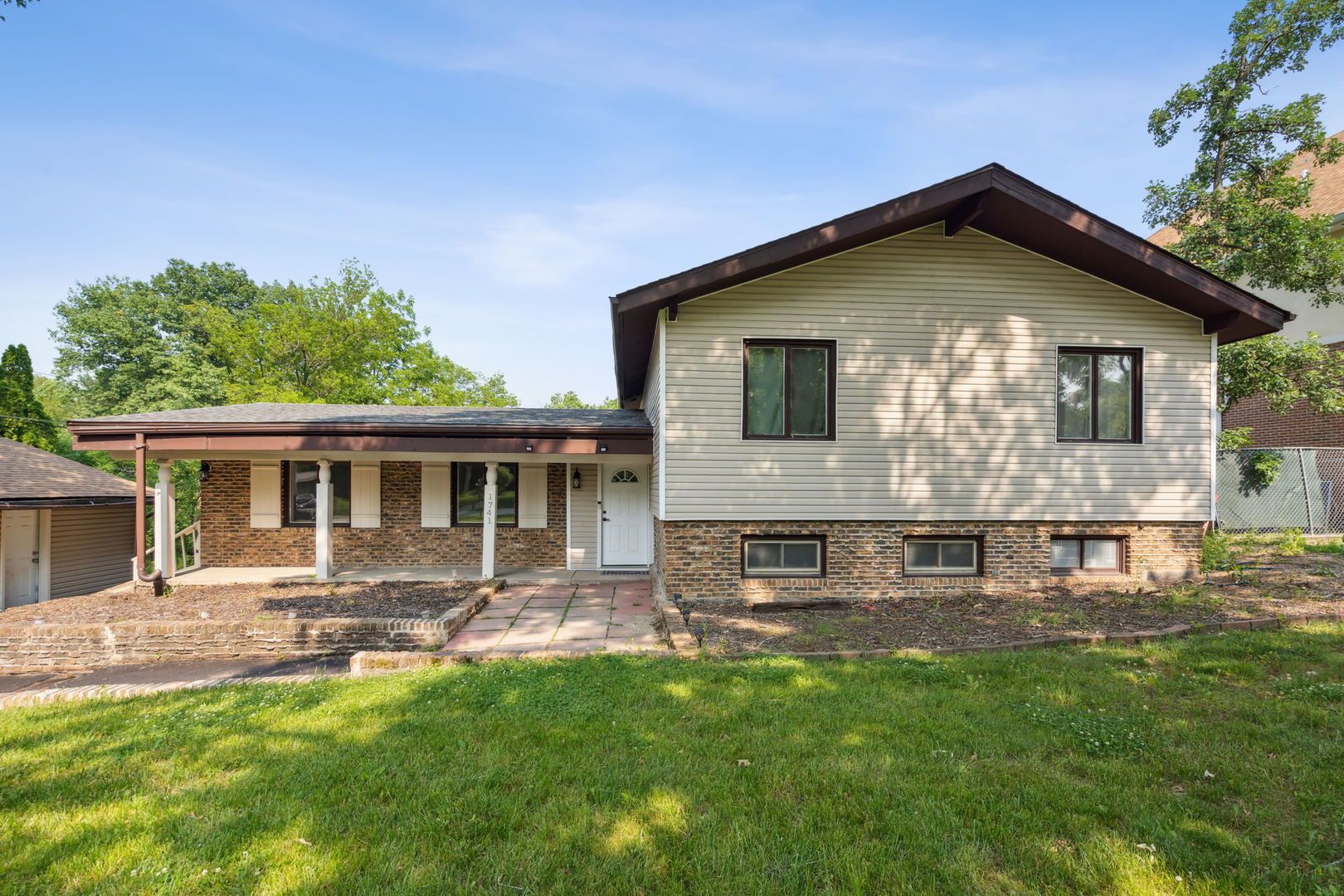 1741 Oak Lane Road Flossmoor, IL 60422 - Photo 2 of 30 a front view of house with yard and green space