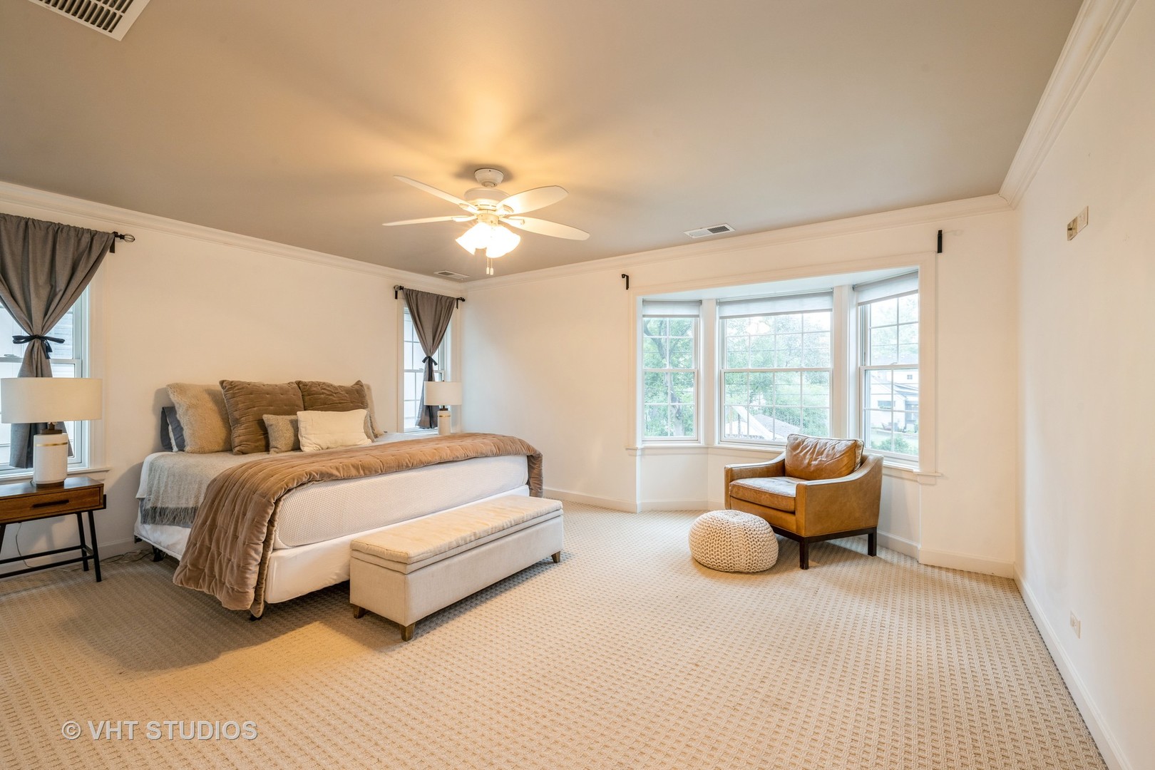 Undisclosed Address Clarendon Hills, IL 60514 - Photo 11 of 21 a spacious bedroom with a bed and glass window