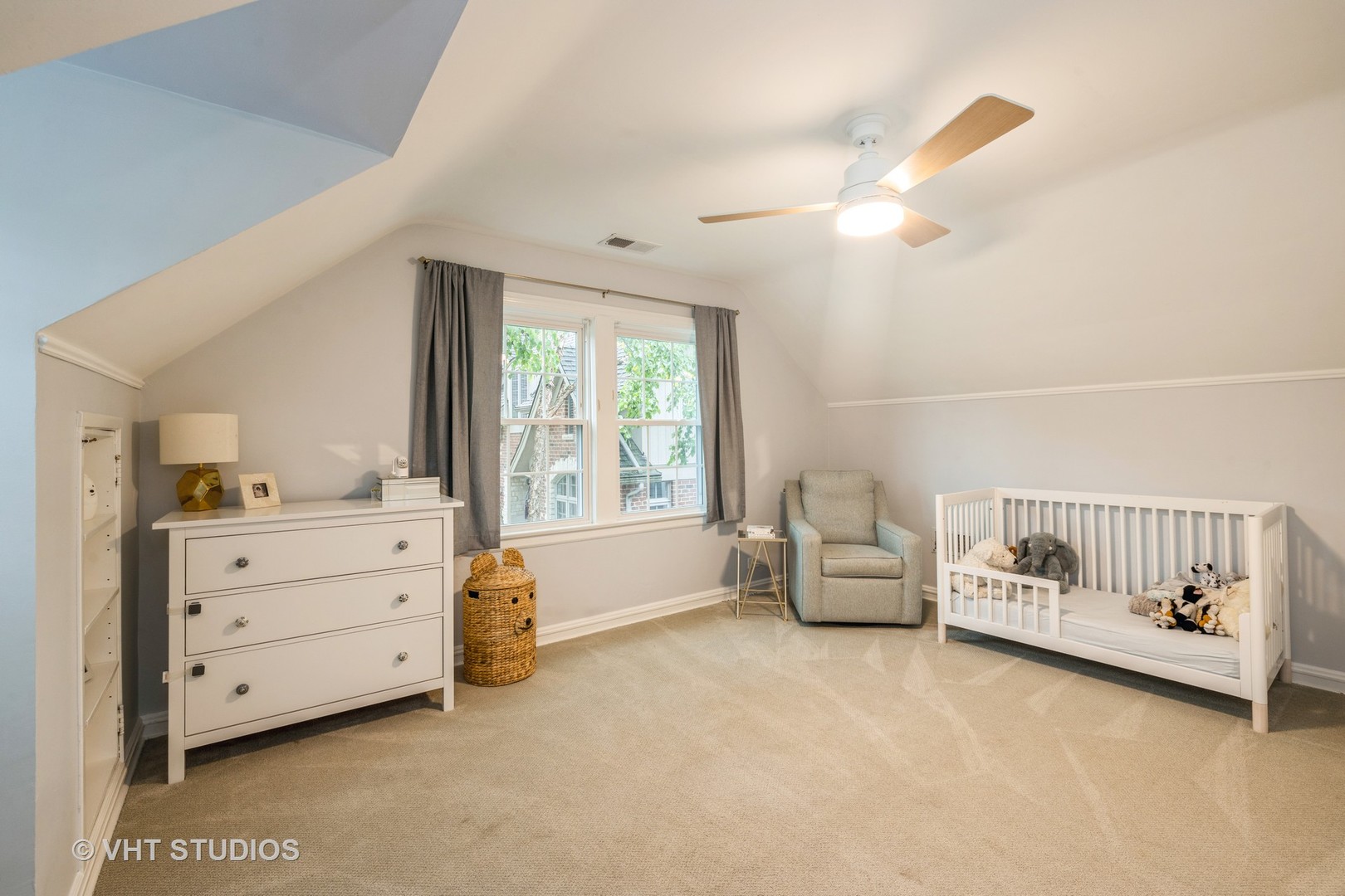 Undisclosed Address Clarendon Hills, IL 60514 - Photo 16 of 21 a bedroom with furniture and a window