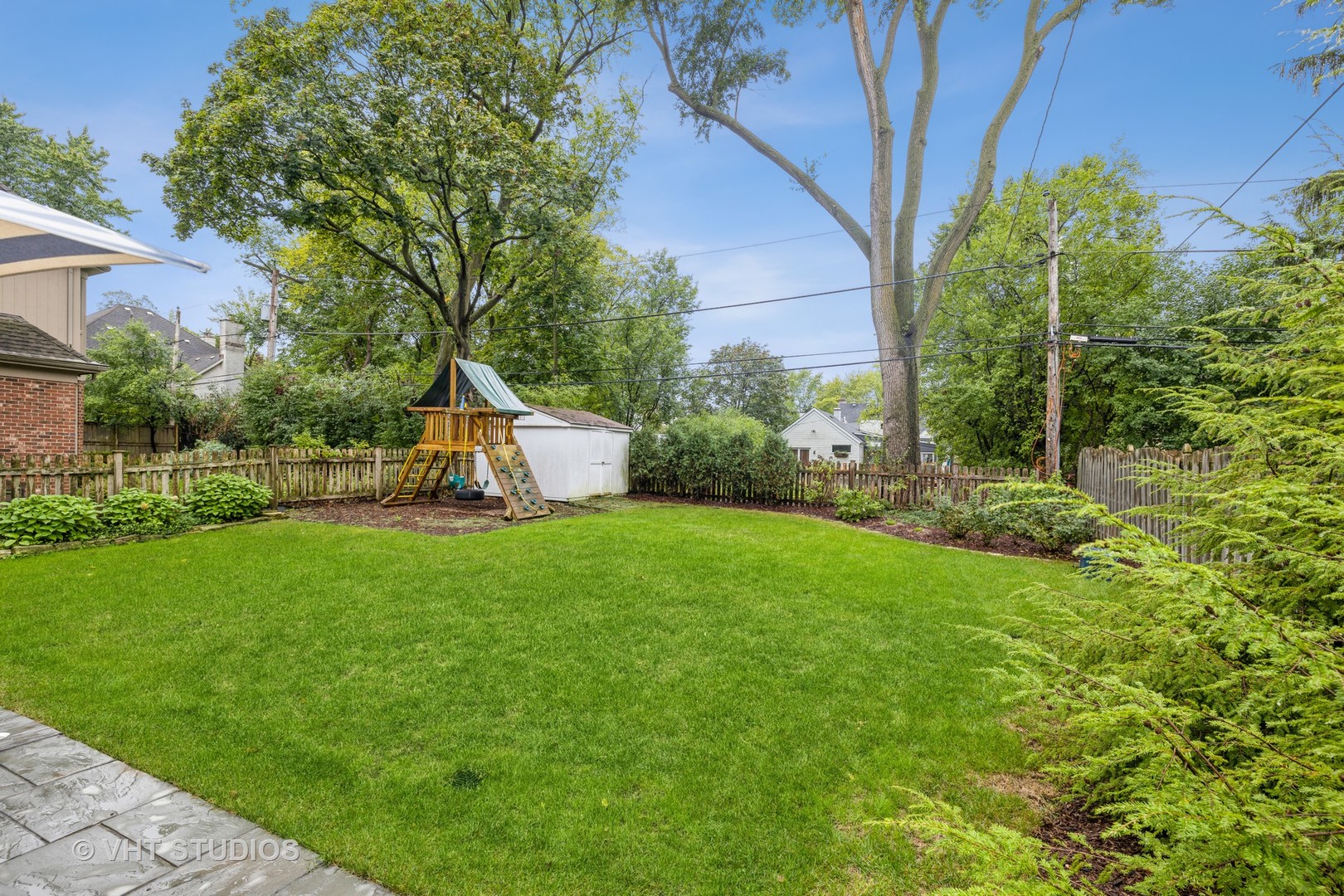 Undisclosed Address Clarendon Hills, IL 60514 - Photo 21 of 21 a view of a house with backyard and garden