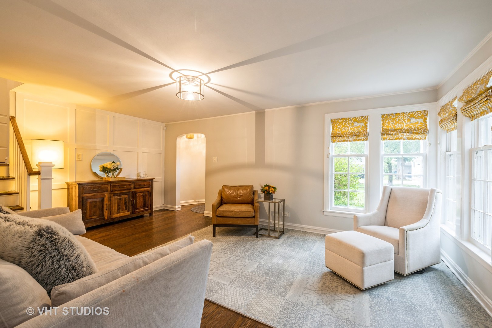 Undisclosed Address Clarendon Hills, IL 60514 - Photo 3 of 21 a living room with furniture and a flat screen tv