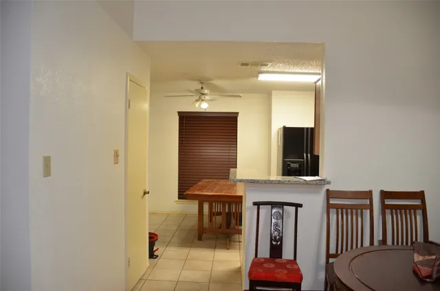 a view of a livingroom with furniture and front door