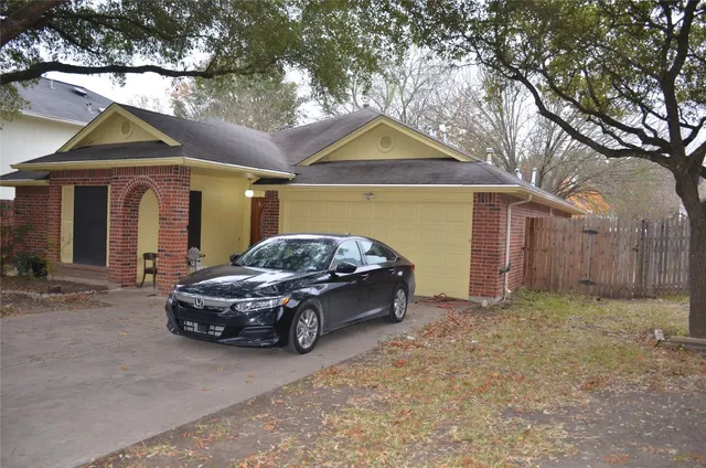 a car parked in front of house
