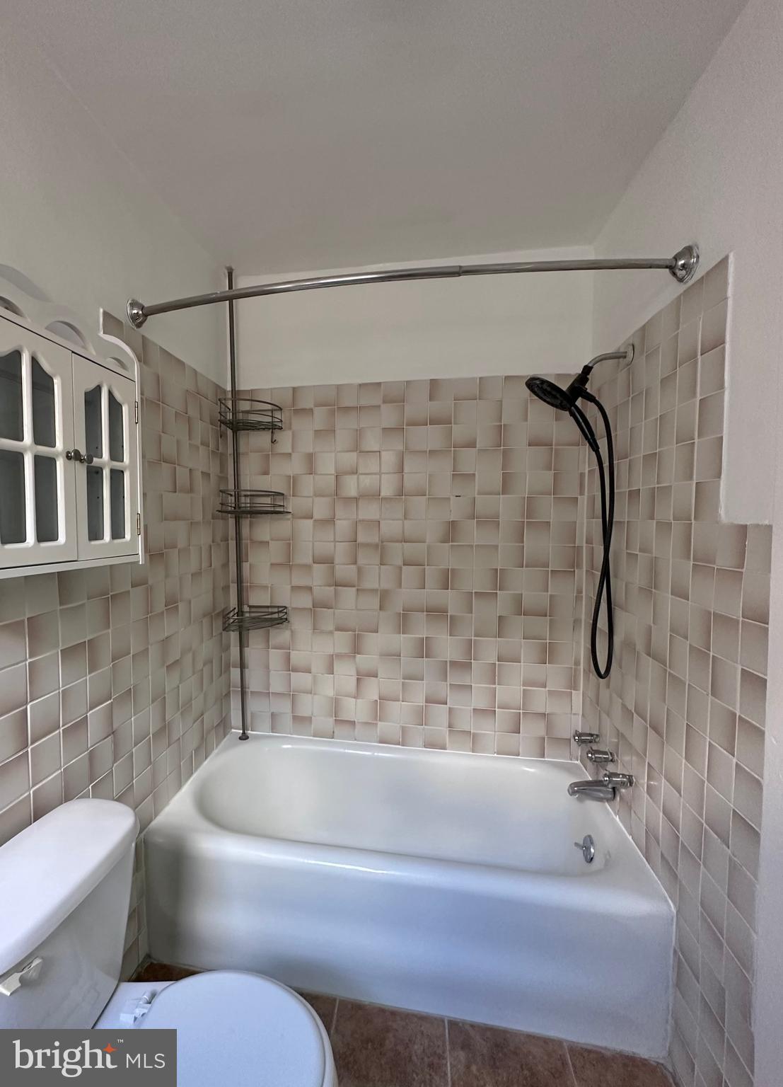 411 Burmont Road Drexel Hill, PA 19026 - Photo 16 of 28 a bathroom with a bathtub and shower