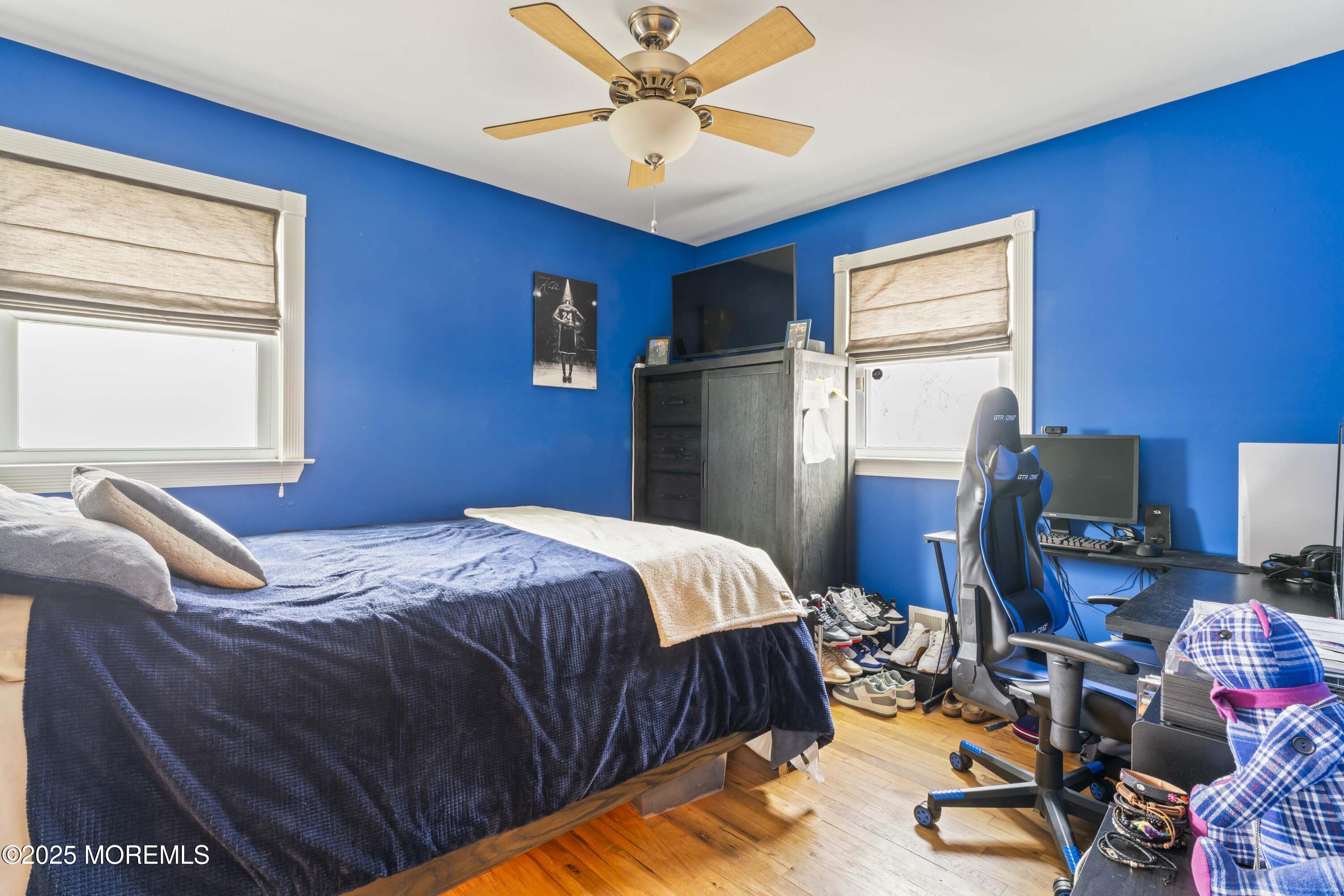 12 Nottingham Drive Howell, NJ 07731 - Photo 15 of 34 a bedroom with a bed and a desk