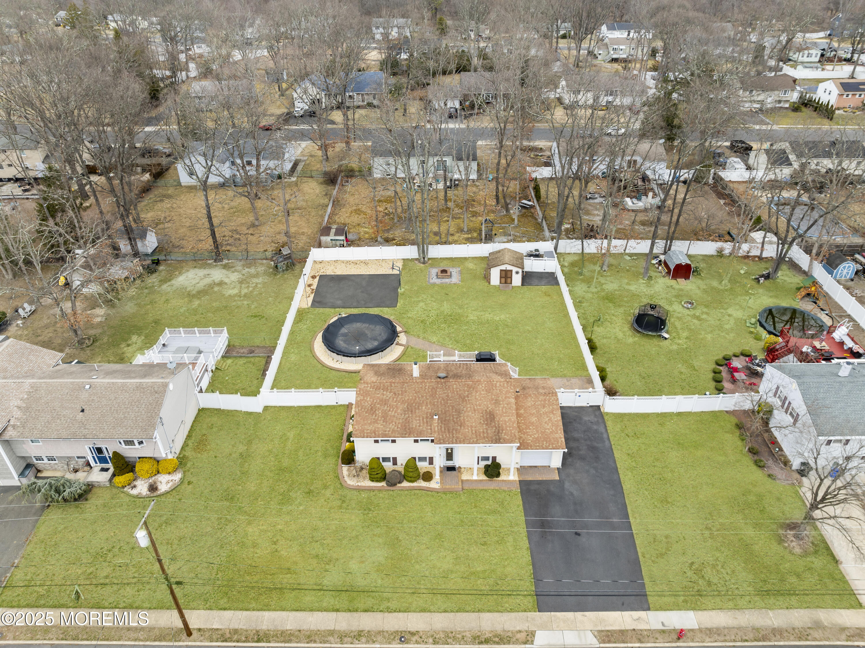 12 Nottingham Drive Howell, NJ 07731 - Photo 24 of 34 an aerial view of a house with a swimming pool