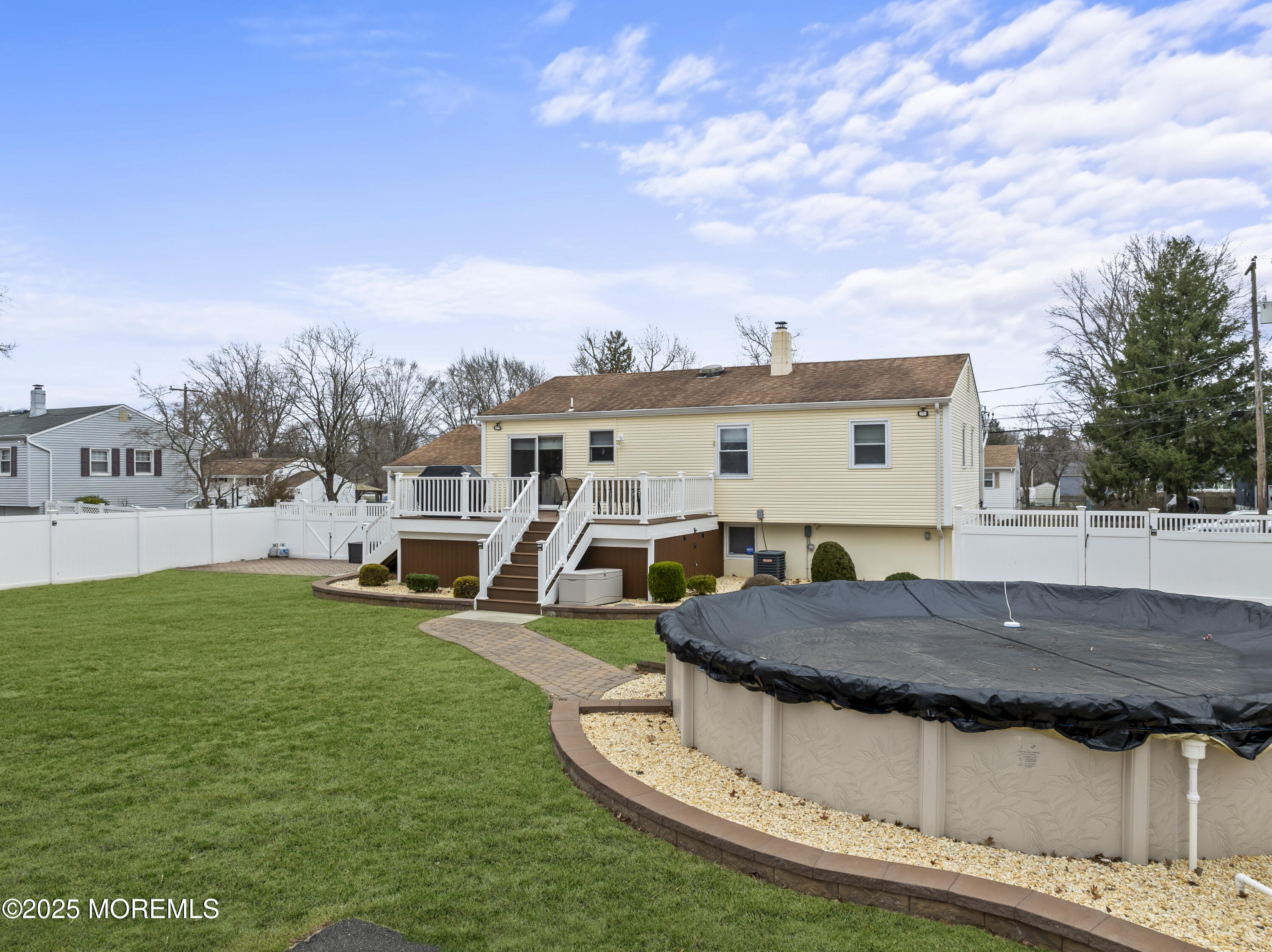 12 Nottingham Drive Howell, NJ 07731 - Photo 29 of 34 a view of a house with backyard and sitting area