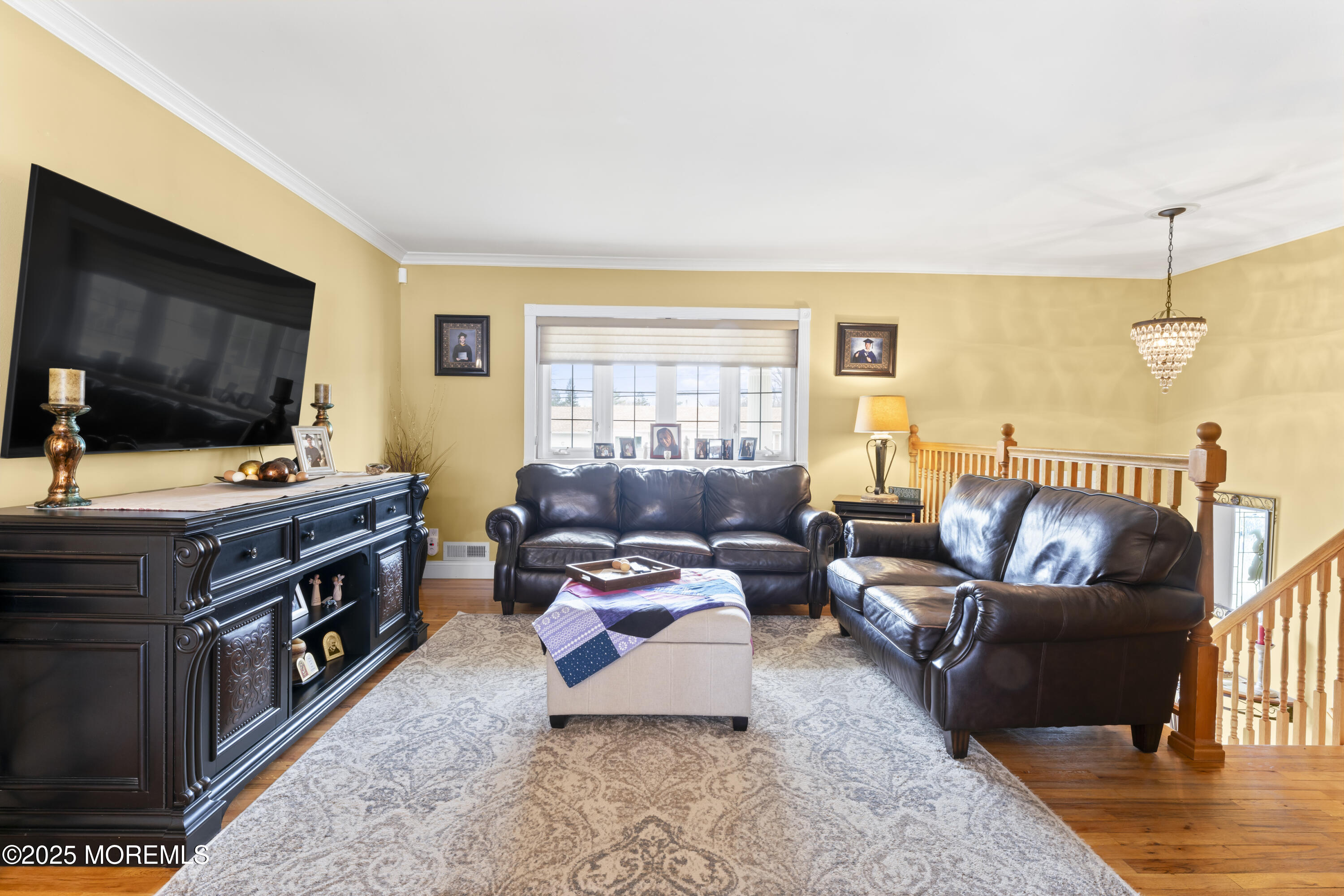 12 Nottingham Drive Howell, NJ 07731 - Photo 5 of 34 a living room with furniture and a flat screen tv