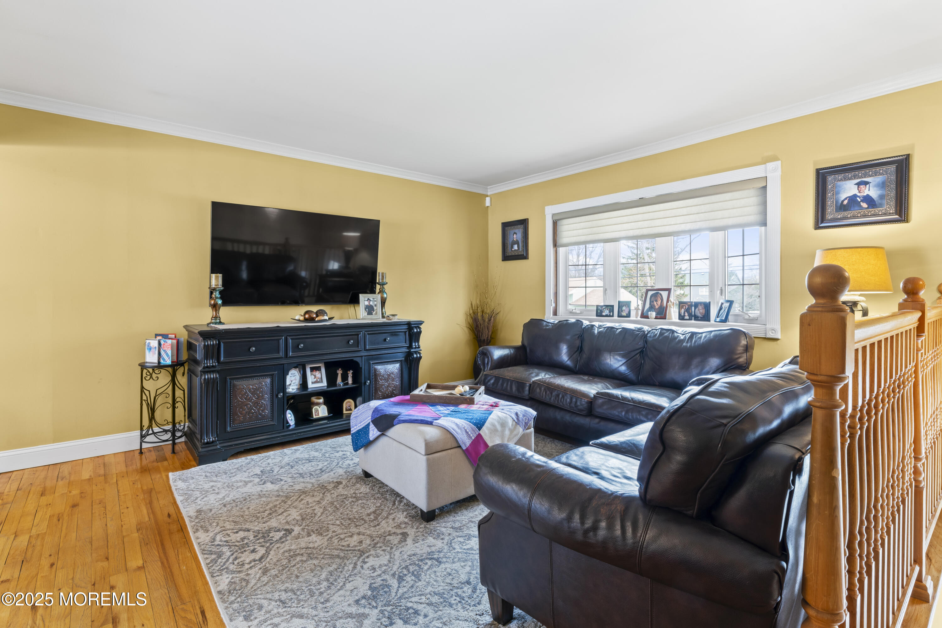 12 Nottingham Drive Howell, NJ 07731 - Photo 6 of 34 a living room with furniture and a flat screen tv