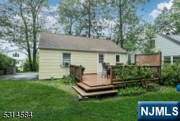 41 Bellot Road Ringwood, NJ 07456 - Photo 13 of 14 a view of a house with backyard and a garden